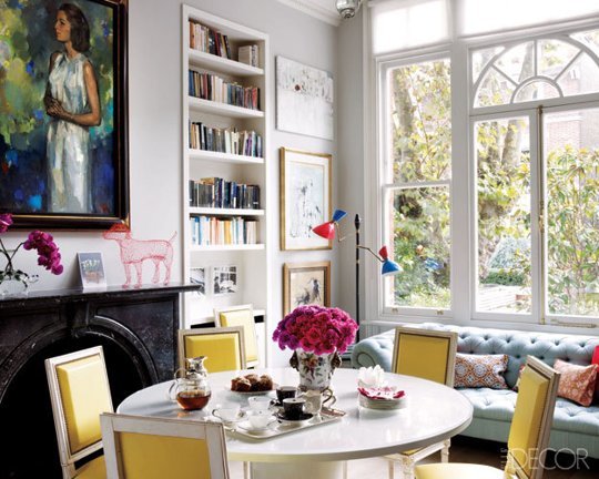 Christine D'Ornano's home in Elle Decoration: colourful chairs, art and accessories lift neutral backdrop