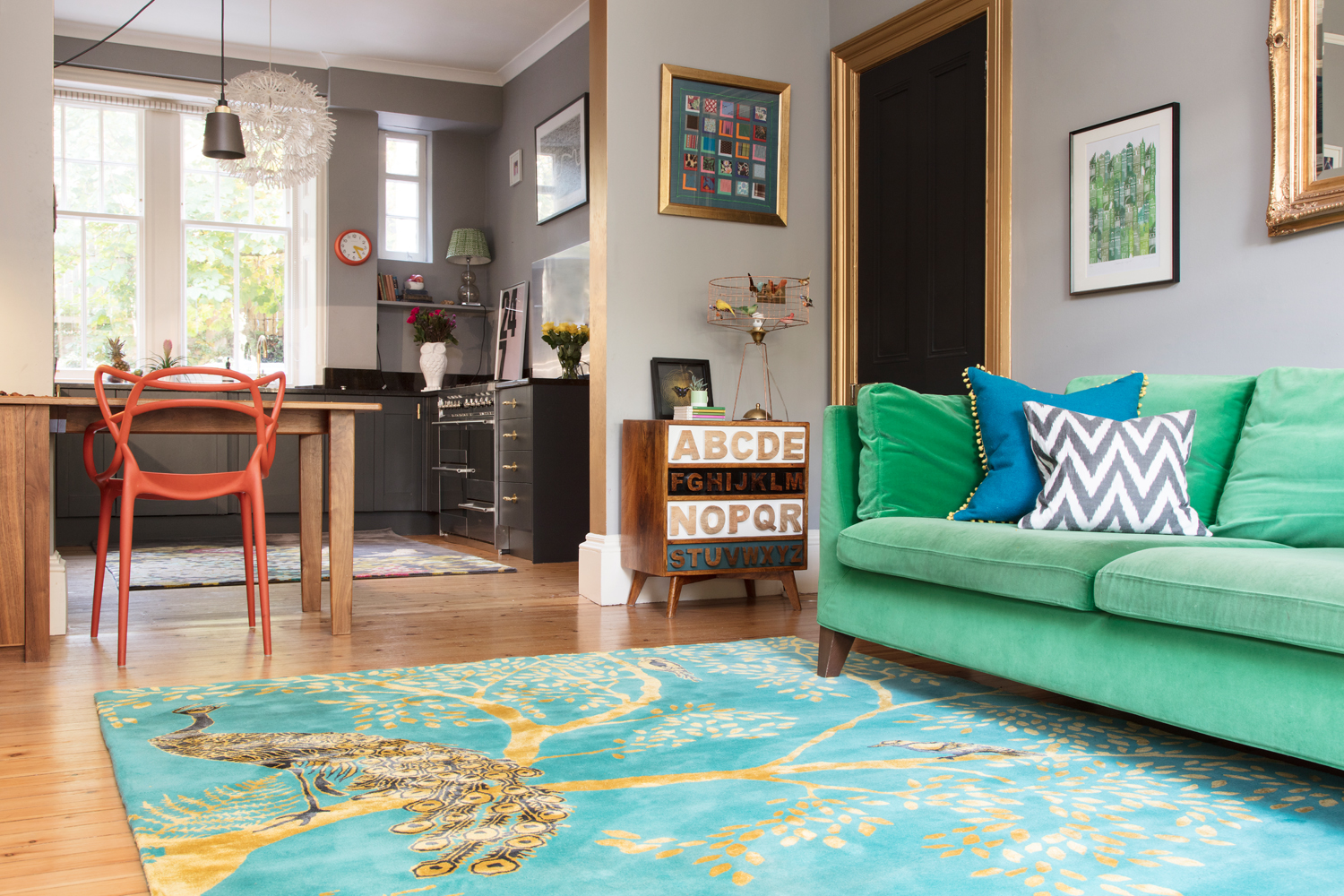 The Pink House living room with Farrow &amp; Ball Manor House Gray walls and Wendy Morrison Design 'Enchanted Wood' rug/Photo: Susie Lowe